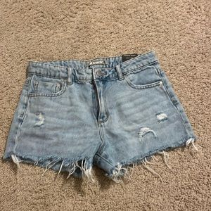 Blue jean shorts, never worn, size 14 child’s